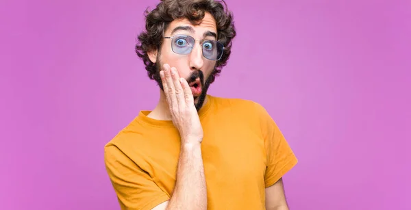 Young Crazy Cool Man Feeling Shocked Astonished Holding Face Hand — Stock Photo, Image