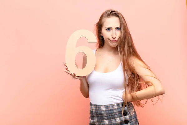 Yound Blonde Woman Angry Anger Disagreement Holding Number — Stock Photo, Image