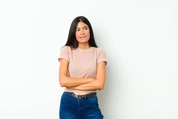 Young Pretty Latin Woman Doubting Thinking Biting Lip Feeling Insecure — Stock Photo, Image