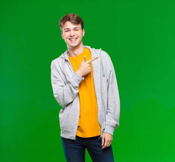 Young Blonde Man Looking Excited Surprised Pointing Side Upwards Copy — Stock Photo, Image