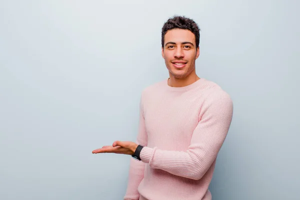 Young Arabian Man Smiling Cheerfully Feeling Happy Showing Concept Copy — Stock Photo, Image
