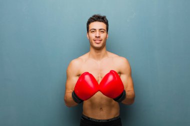 Boks eldivenli genç bir Arap. spor konsepti
