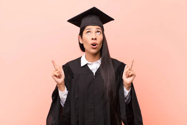 Young Latin Woman Student Feeling Awed Open Mouthed Pointing Upwards — Stock Photo, Image