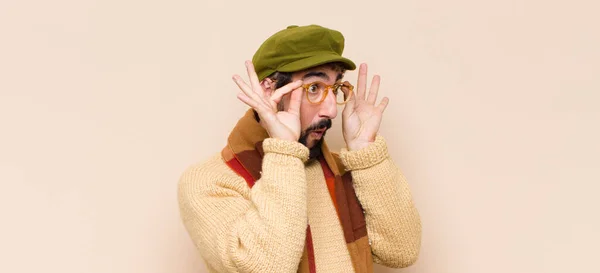 Young Cool Bearded Man Feeling Shocked Amazed Surprised Holding Glasses — Stock Photo, Image