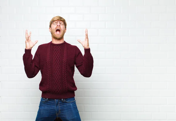 Young Blonde Man Furiously Screaming Feeling Stressed Annoyed Hands Air — Stock Photo, Image