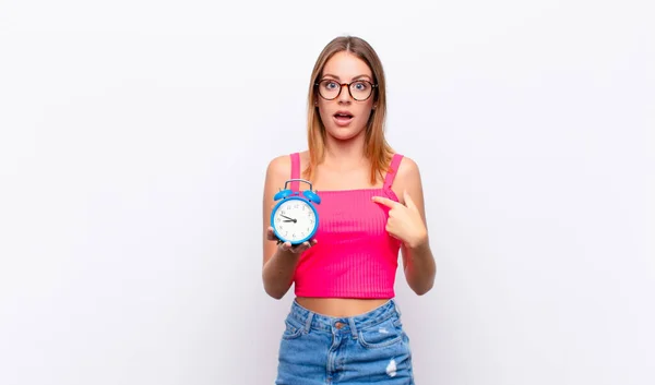 Red Head Pretty Woman Holding Alarm Clock Expressing Concept — Stock Photo, Image