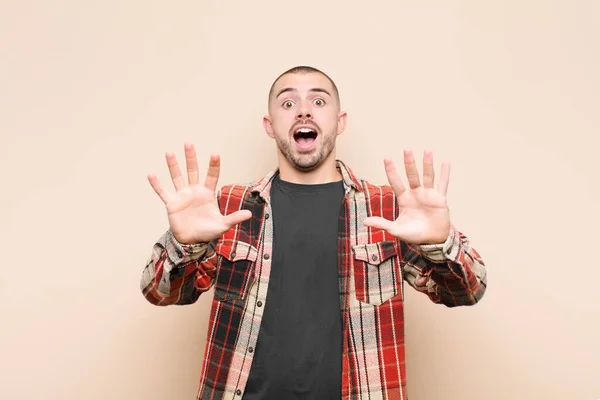 Young Handsome Man Feeling Stupefied Scared Fearing Something Frightening Hands — Stock Photo, Image