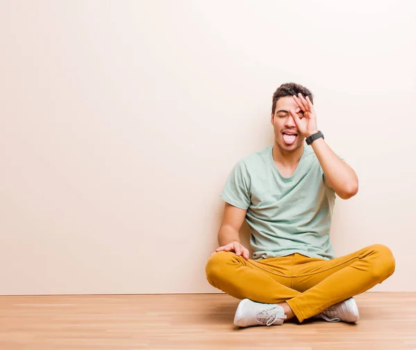 Young Arabian Man Smiling Happily Funny Face Joking Looking Peephole — Stock Photo, Image