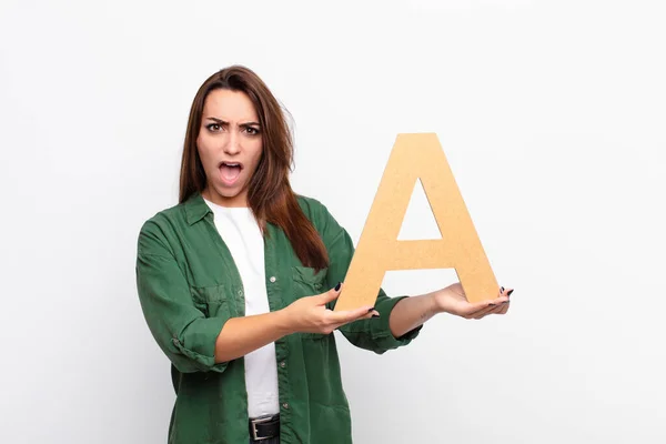 Young Pretty Woman Angry Anger Disagreement Holding Letter Alphabet Form — Stock Photo, Image