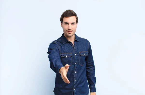 Young Handsome Man Smiling Looking Happy Confident Friendly Offering Handshake — Stock Photo, Image