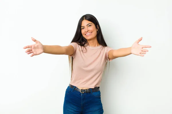 Young Pretty Latin Woman Smiling Cheerfully Giving Warm Friendly Loving — Stock Photo, Image