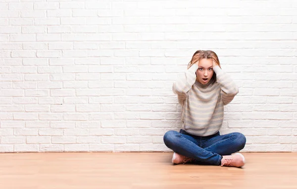 Young Blonde Pretty Girl Feeling Horrified Shocked Raising Hands Head — Stock Photo, Image