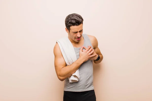 Young Arabian Man Looking Sad Hurt Heartbroken Holding Both Hands — Stock Photo, Image