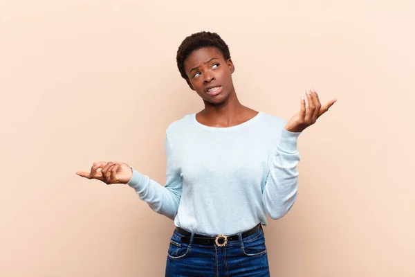 Young Pretty Black Womanshrugging Dumb Crazy Confused Puzzled Expression Feeling —  Fotos de Stock