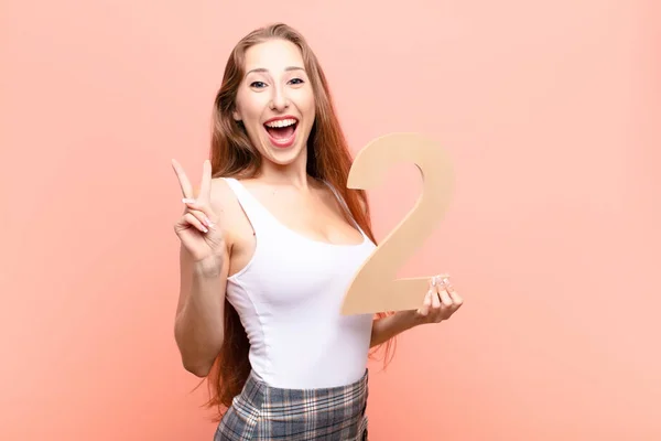 Yound Blonde Woman Excited Happy Joyful Holding Number — Stock Photo, Image
