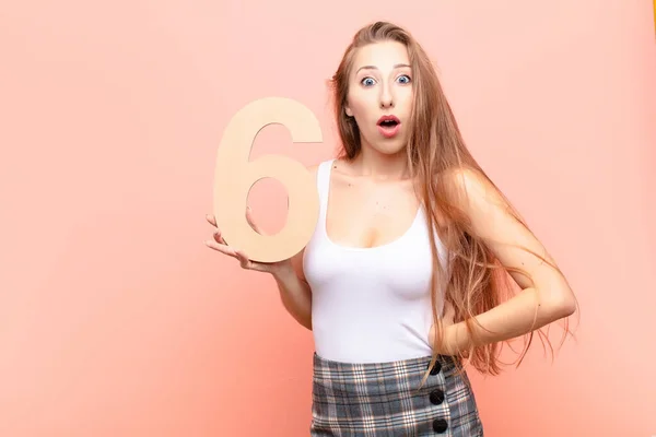 Yound Blonde Woman Surprised Shocked Amazed Holding Number — Stock Photo, Image