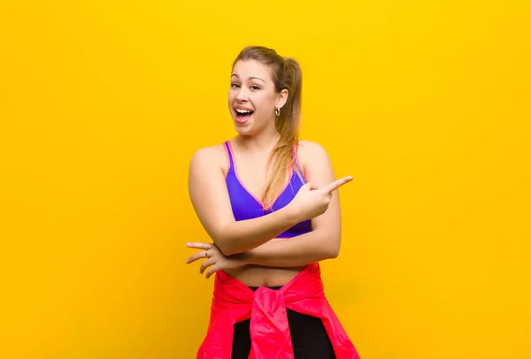 Young Blonde Woman Looking Excited Surprised Pointing Side Upwards Copy — Stock Photo, Image