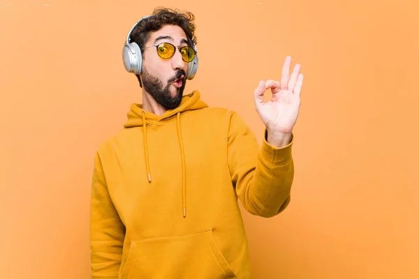 Young Crazy Cool Man Listening Music Headphones Orange Wall — Stock Photo, Image