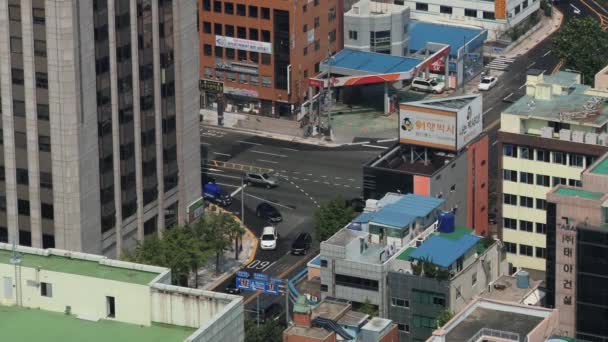 Vista a los edificios de la ciudad y las calles desde arriba en Busan, Corea . — Vídeos de Stock