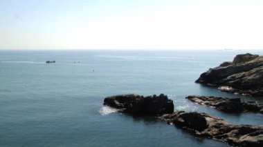 Busan, Kore Haedong Yonggung Budist tapınağı ve deniz için görüntüleyin.