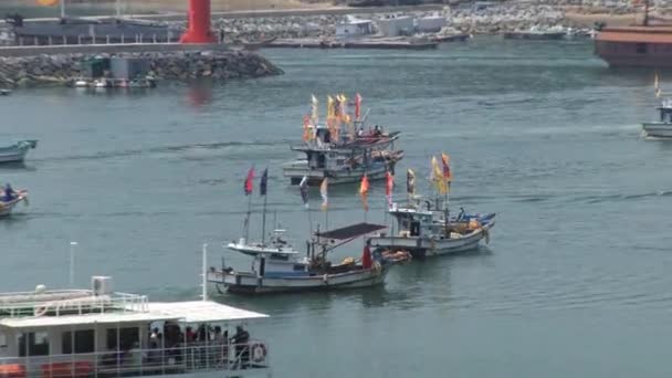 Boats depart from harbor during Hansan festival in Tongyeong, Korea. — Stock Video