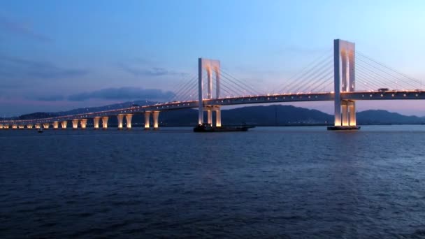 View to the modern automobile bridge at dusk in Macu, China. — Stock Video