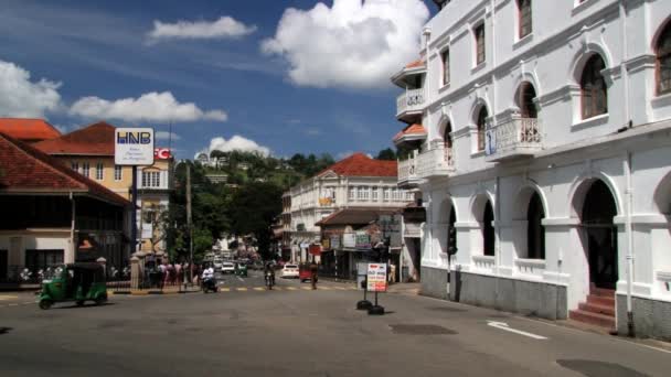 View to the traffic at the street in downtown Kandy, Sri Lanka. — Stock Video