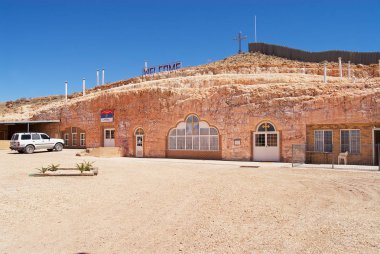 Exterior of the underground Serbian Orthodox Church in Coober Pedy, Australia.  clipart