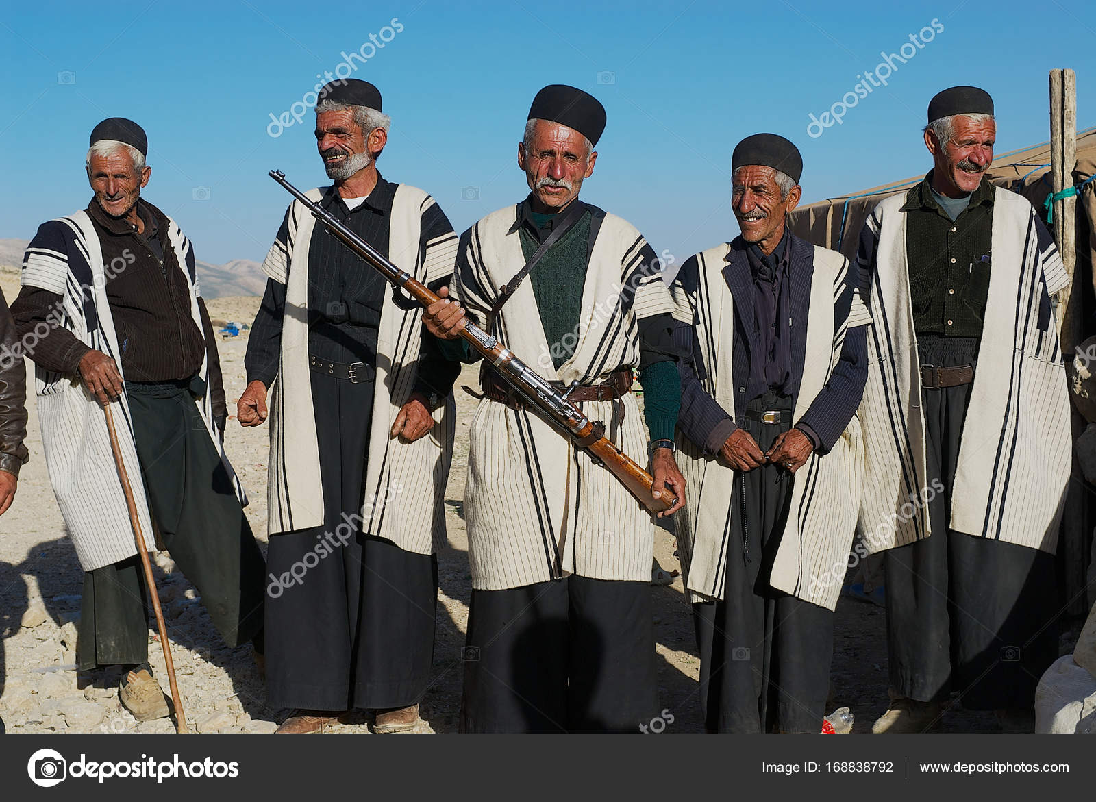 Bakhtiari nomad tribe men wear traditional dresses circa Isfahan, Iran ...