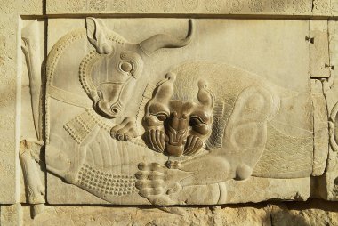Bas Rölyef bir boğa ve bir aslan-Persepolis Şiraz, İran'ın kalıntıları.