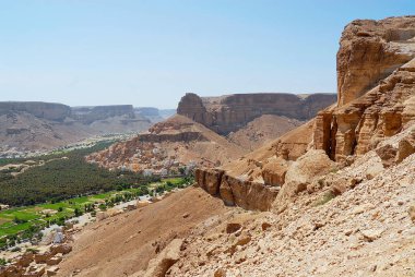 View to the city of Seiyun in Hadramaut valley, Yemen. clipart