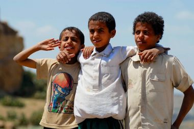 SANAA, YEMEN - SEPTEMBER 08, 2006: Portrait of three kids at the street in Sanaa, Yemen. clipart
