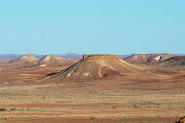 The Breakaways reserve near Coober Pedy at sunset in South Australia, Australia. clipart
