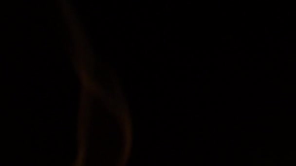 The Candle Smoke Playing Against the Black Background. — Stock Video