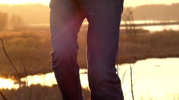 Fair Headed Young Mad Full of Positive Emotions is Dancing on a Lawn Outdoors in a Shirt and Jeans Energetically in Slow Motion — Stock Video