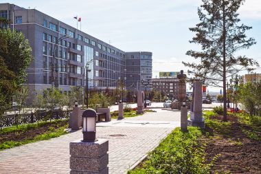 Views on the Avenue of Marshal Pokryshkina and the building of administration of the Novosibirsk region clipart