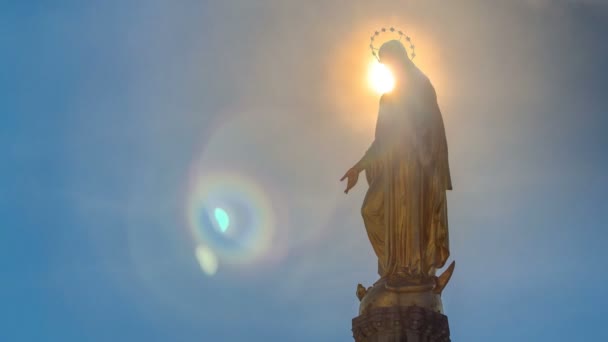 Holy Mary monument with sun behind it on square in front of the Cathedral timelapse in Zagreb, Croatia
