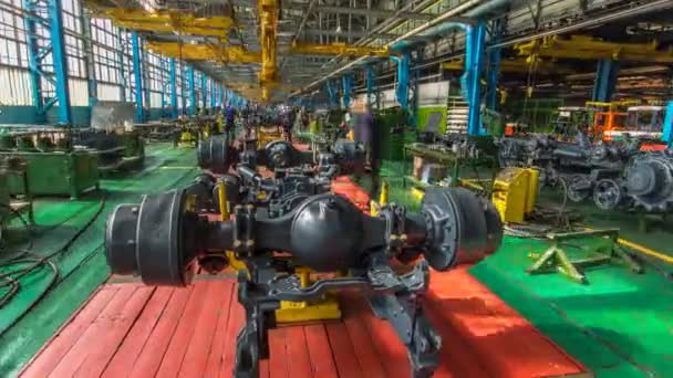 Conveyor assembly stage the body of tractor at factory timelapse — Stock Video