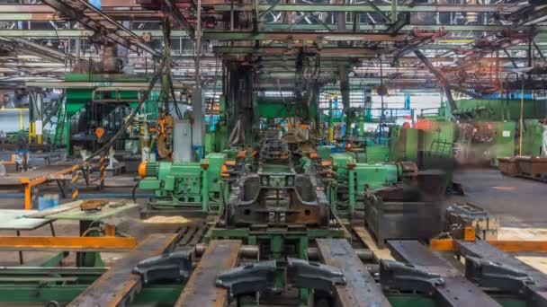 Conveyor assembly stage the body of tractor at factory timelapse — Stock Video