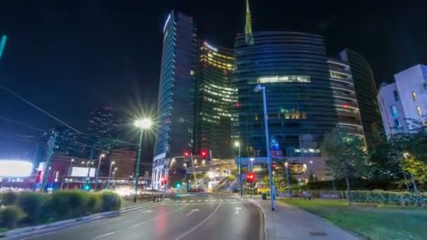 Milan skyline with modern skyscrapers in Porta Nuova business district night timelapse hyperlapse in Milan, Italy