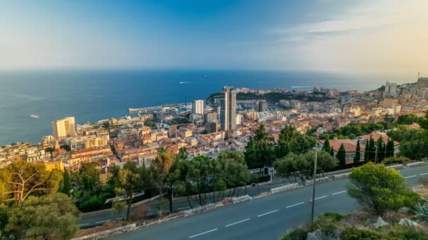 Panoráma města timelapse z Monte Carlo, Monako se střechami budov během letní západ slunce. — Stock video