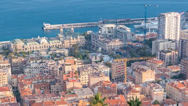 Panoráma města timelapse z Monte Carlo, Monako se střechami budov během letní západ slunce. — Stock video
