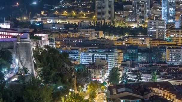 Panorama de Monte Carlo timelapse por la noche desde la plataforma de observación en el pueblo de Mónaco cerca de Port Hércules . — Vídeo de stock