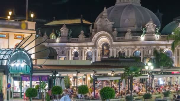 ビューの場所のデュ カジノ。モンテカルロのカジノ夜のタイムラプス近くカフェ. — ストック動画