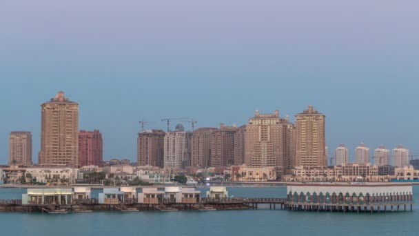 View from Katara Beach day to night timelapse in Doha, Qatar, towards the Pearl — Stock Video