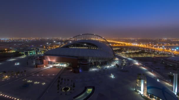 Vista aerea dello stadio Aspire Zone dall'alto notte al giorno timelapse a Doha — Video Stock