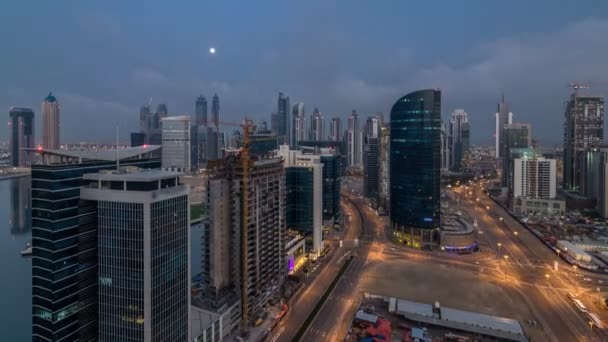 Dobai Innenstadt Nacht zu Tag Zeitraffer. Luftaufnahme über der futuristischen Großstadt bei Nacht. — Stockvideo