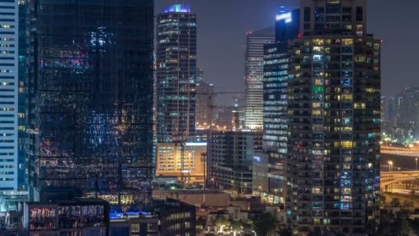 Dubai Marina w nocy timelapse, błyszczące światła i najwyższych wieżowców — Wideo stockowe