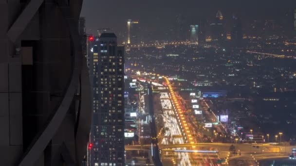 Dubai Downtown éjszaka timelapse modern tornyok, panorámás kilátás a tetején Dubai, Egyesült Arab Emírségek. — Stock videók