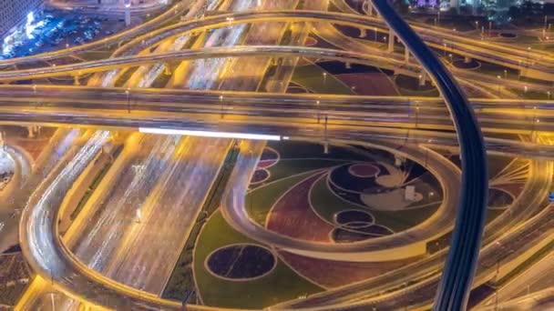 Night traffic on a busy intersection on Sheikh Zayed highway aerial timelapse — Stock Video